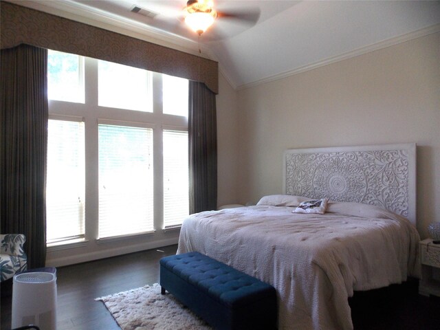 23423 Tavola Rosa Dr, New Caney, TX 77357 - bedroom with ornamental molding, multiple windows, lofted ceiling, wood finished floors, and a ceiling fan