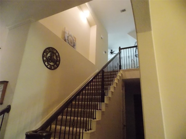 23423 Tavola Rosa Dr, New Caney, TX 77357 - stairs with a ceiling fan