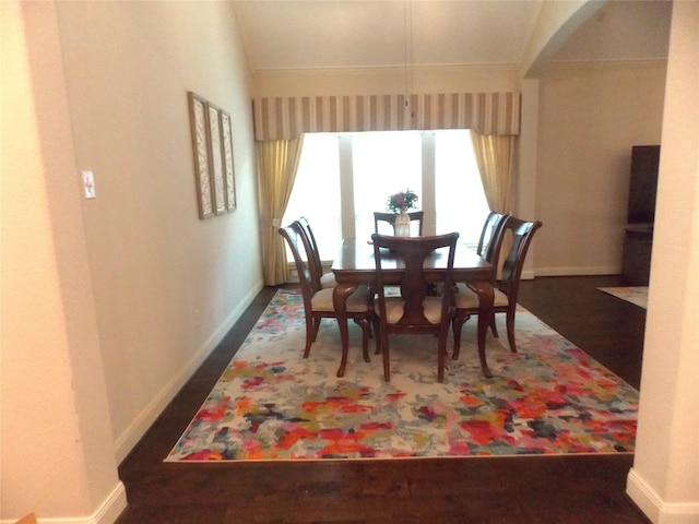 23423 Tavola Rosa Dr, New Caney, TX 77357 - dining space with crown molding, baseboards, wood finished floors, and arched walkways