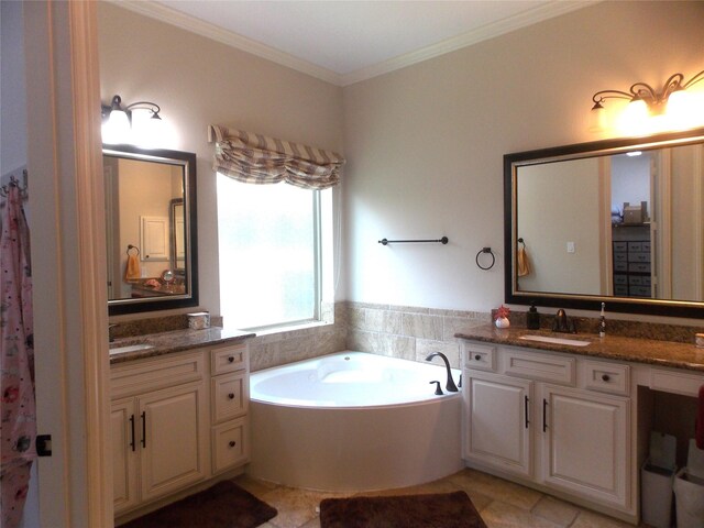 23423 Tavola Rosa Dr, New Caney, TX 77357 - full bath featuring two vanities, a bath, ornamental molding, and tile patterned flooring