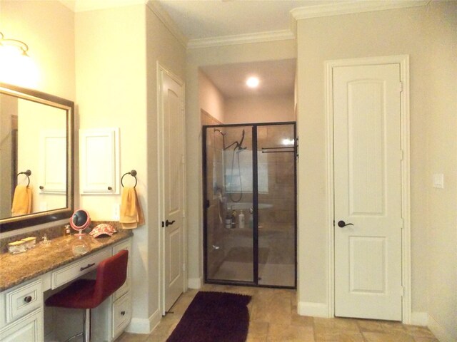 23423 Tavola Rosa Dr, New Caney, TX 77357 - bathroom with a shower stall, baseboards, vanity, and ornamental molding