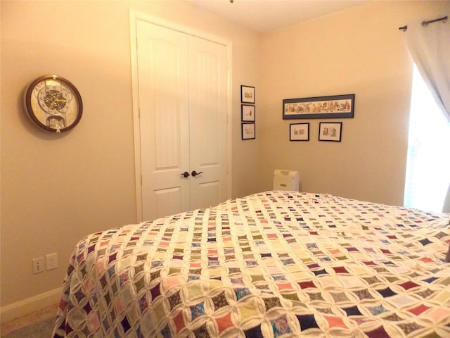 23423 Tavola Rosa Dr, New Caney, TX 77357 - bedroom with a closet and baseboards