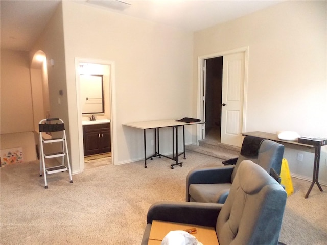 23423 Tavola Rosa Dr, New Caney, TX 77357 - sitting room with carpet flooring, arched walkways, and baseboards