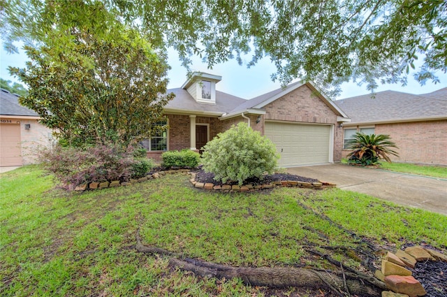 view of front facade featuring a garage, a front lawn, brick siding, and concrete driveway