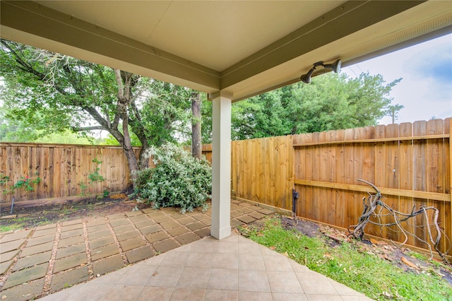 view of patio with a fenced backyard