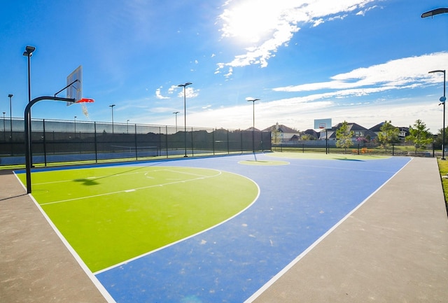 view of sport court with community basketball court and fence