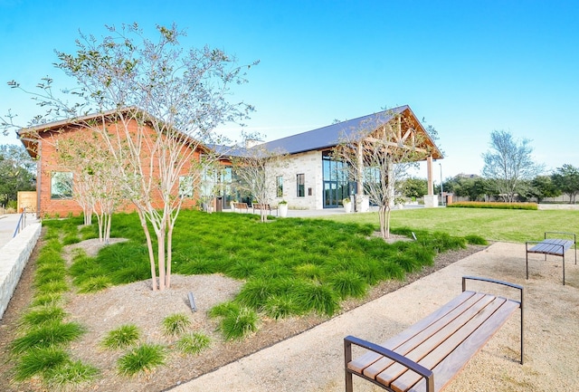 surrounding community featuring a yard