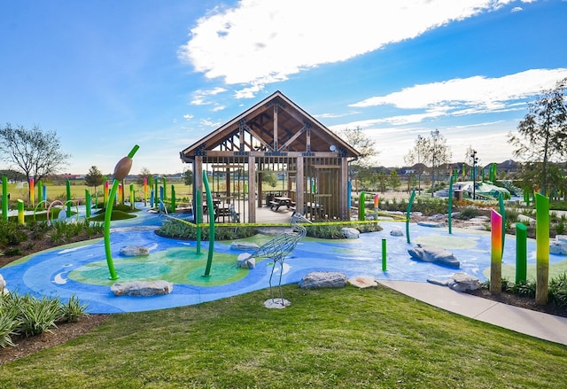 view of playground featuring a lawn