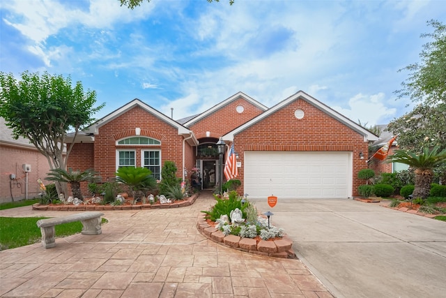 ranch-style house featuring concrete driveway, brick siding, and a garage