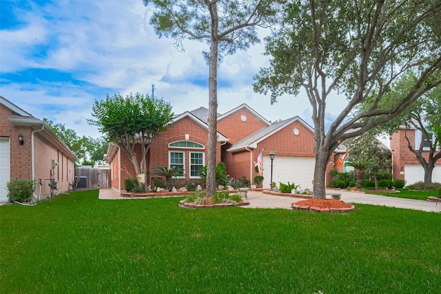 ranch-style house featuring a front yard, brick siding, fence, concrete driveway, and an attached garage