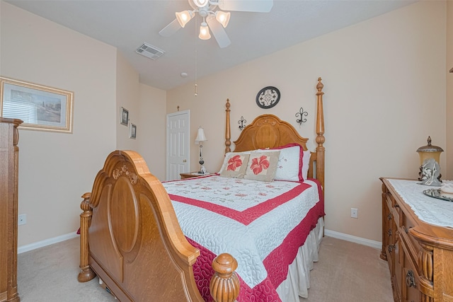 bedroom with baseboards, ceiling fan, light colored carpet, and visible vents