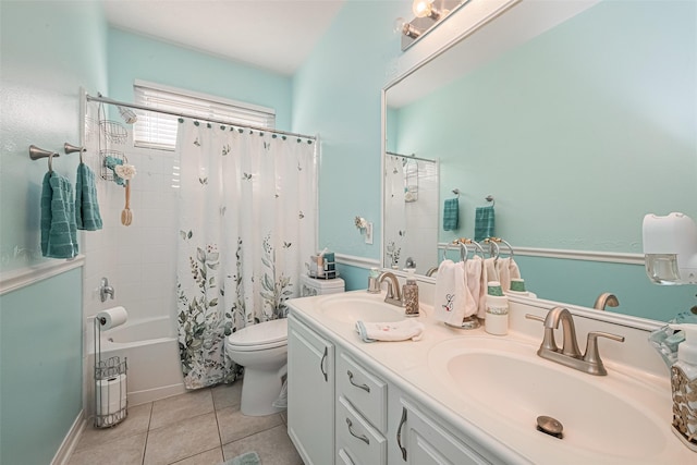 bathroom with a sink, shower / bathtub combination with curtain, tile patterned floors, and toilet