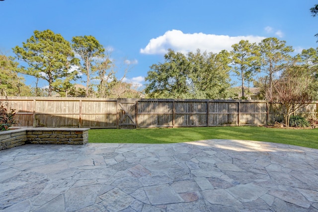 view of patio with a fenced backyard