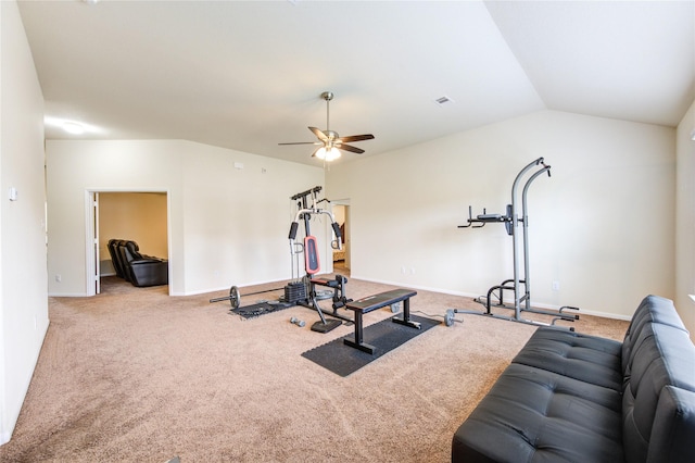workout area with a ceiling fan, visible vents, carpet floors, and vaulted ceiling