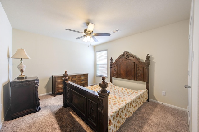 bedroom with baseboards, a ceiling fan, and light colored carpet