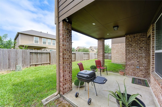 view of patio / terrace featuring grilling area and a fenced backyard