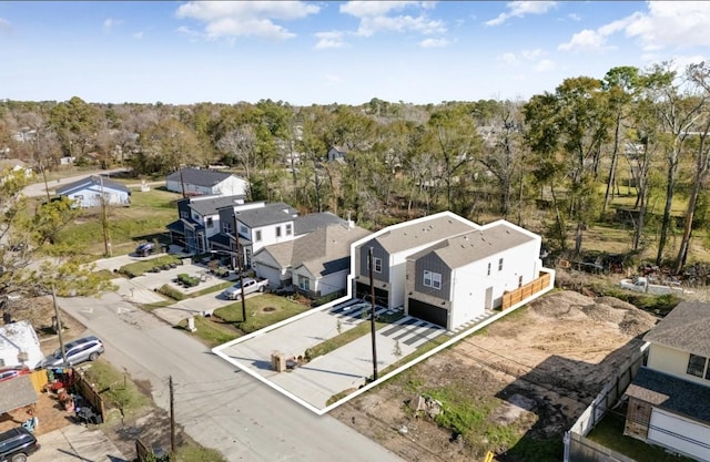 birds eye view of property with a residential view
