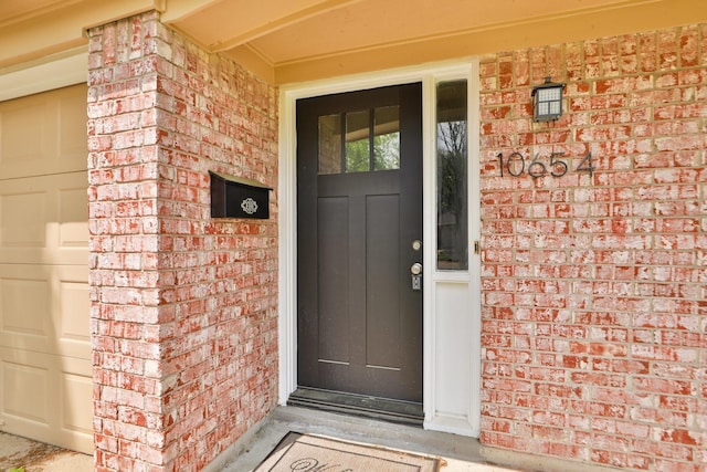 10654 Mayfield Rd, Houston, TX 77043 - property entrance with brick siding