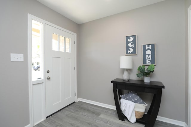 10654 Mayfield Rd, Houston, TX 77043 - entryway featuring wood finished floors and baseboards