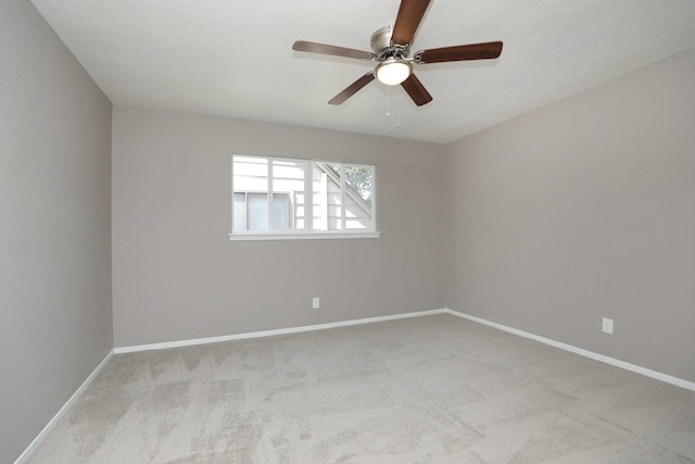 10654 Mayfield Rd, Houston, TX 77043 - carpeted spare room featuring a ceiling fan and baseboards