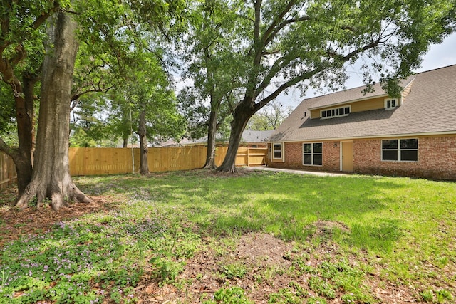 10654 Mayfield Rd, Houston, TX 77043 - view of yard featuring a fenced backyard