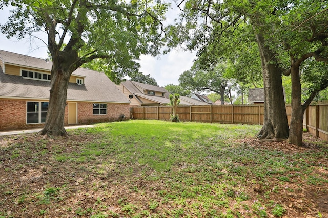 10654 Mayfield Rd, Houston, TX 77043 - view of yard with a fenced backyard