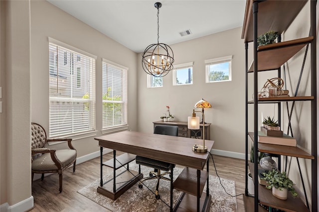 3105 Magnolia Knoll Ln, Houston, TX 77080 - office space with baseboards, an inviting chandelier, light wood-style flooring, and visible vents