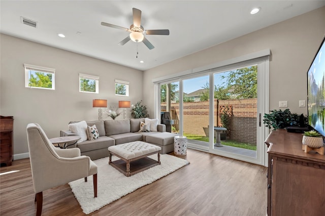 3105 Magnolia Knoll Ln, Houston, TX 77080 - living area featuring recessed lighting, ceiling fan, visible vents, and wood finished floors