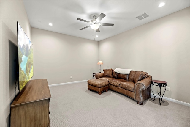 carpeted living room featuring visible vents, a ceiling fan, baseboards, and recessed lighting