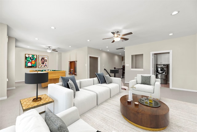 living room with pool table, ceiling fan, light carpet, and baseboards