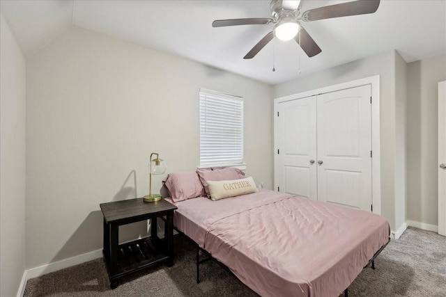 bedroom featuring a closet, carpet flooring, baseboards, and a ceiling fan