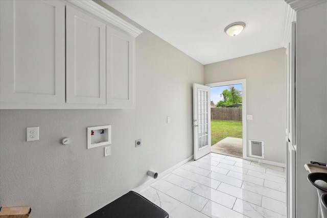 laundry room with marble finish floor, hookup for an electric dryer, hookup for a washing machine, baseboards, and cabinet space