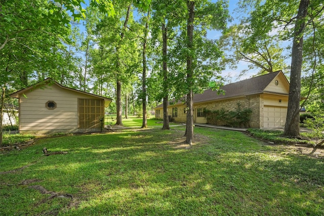 12 Cherry Hill Dr, Conroe, TX 77304 - view of green lawn with an outbuilding