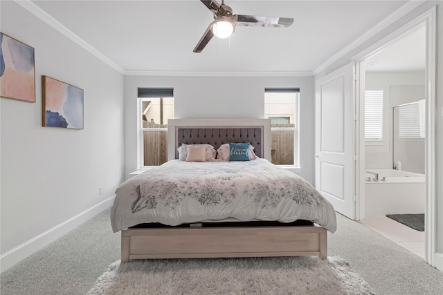 bedroom with connected bathroom, carpet floors, ornamental molding, and baseboards