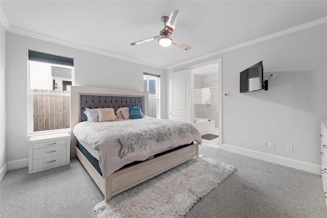 bedroom with baseboards, light colored carpet, a ceiling fan, ensuite bath, and ornamental molding