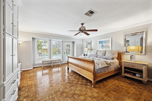 bedroom featuring crown molding, visible vents, ceiling fan, and baseboards