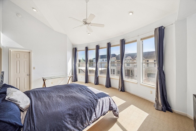 bedroom featuring vaulted ceiling, a ceiling fan, carpet flooring, and baseboards
