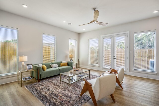 8411 Pech Landing Dr, Houston, TX 77055 - living area with a ceiling fan, wood finished floors, recessed lighting, and baseboards