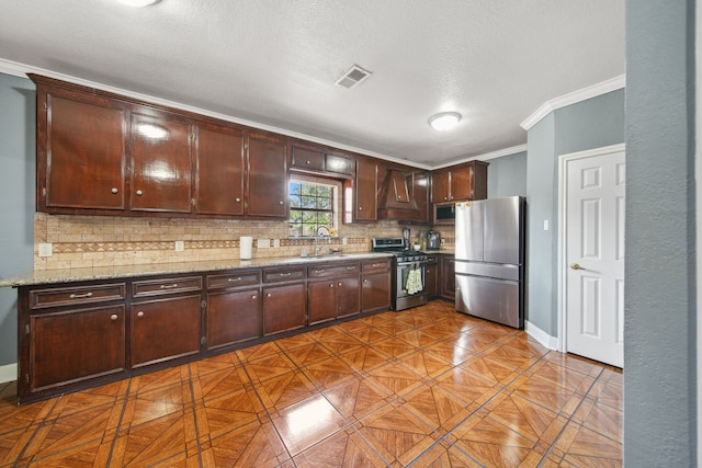 kitchen featuring a sink, decorative backsplash, stainless steel appliances, premium range hood, and ornamental molding