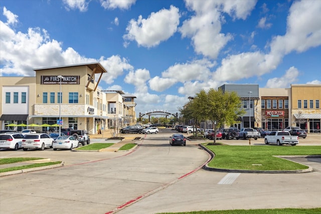 view of road with curbs and sidewalks
