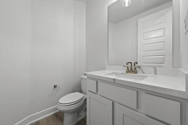 1159 Beals Creek St, Conroe, TX 77304 - half bathroom featuring vanity and wood finished floors