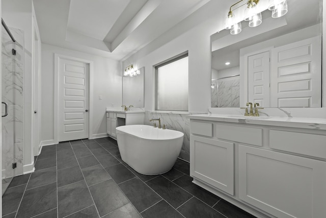 1159 Beals Creek St, Conroe, TX 77304 - bathroom featuring a marble finish shower, two vanities, and a freestanding bath