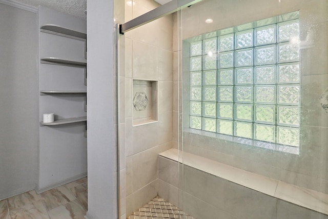 bathroom with a shower stall