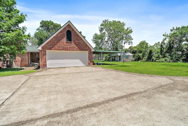 view of front of property with concrete driveway, a front yard, and brick siding