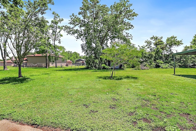 view of yard with fence