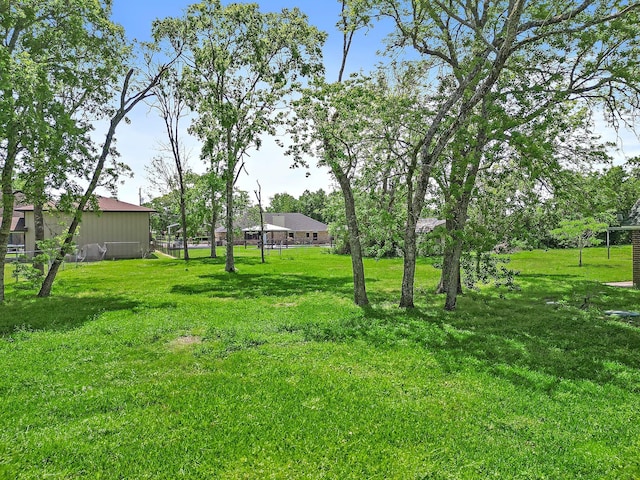 view of yard with fence