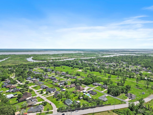 bird's eye view with a water view and a residential view