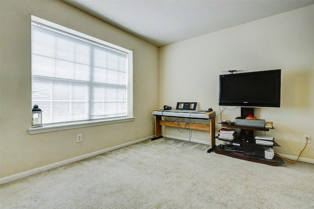 office featuring baseboards and carpet