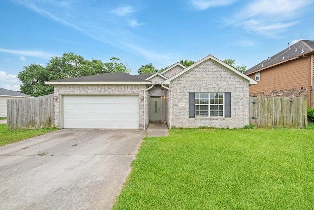 ranch-style house with fence, a front lawn, driveway, and a garage