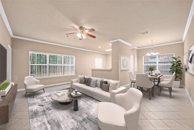 living area with ornamental molding, ceiling fan with notable chandelier, baseboards, visible vents, and light tile patterned flooring